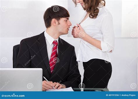 Businesswoman Seducing Boss In Office Stock Photo Image Of Lust