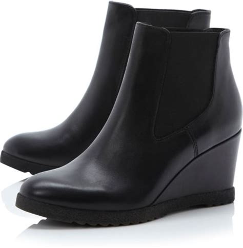 This classic is the stylish essential that will last from season to season. Dune Pontin Wedge Chelsea Low Boots in Black (Black ...