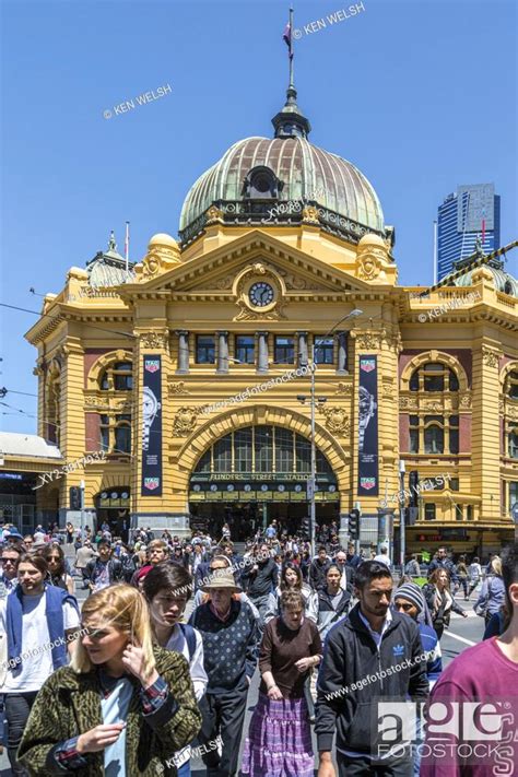 Flinders Street Railway Station At The Intersection Of Flinders And