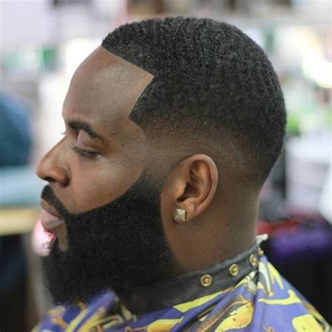 6 short curly hair with shaved sides and design. 50 Stylish Fade Haircuts for Black Men in 2021