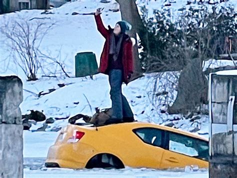 [photo] Image Goes Viral Of Woman Taking Selfie From Sinking Car While Rescuers Race Against