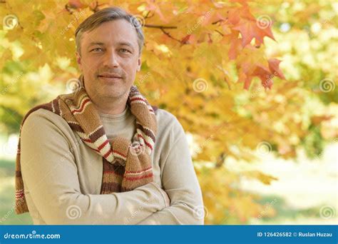 Portrait Of Handsome Man Posing In Park Stock Photo Image Of