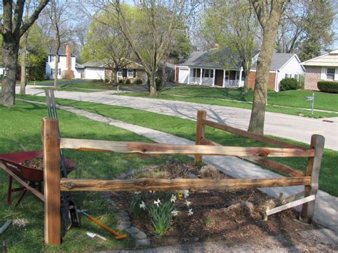 It has wooden posts but the center is constructed of cattle paneling. there it is! - split rail corner fence I want to do this ...