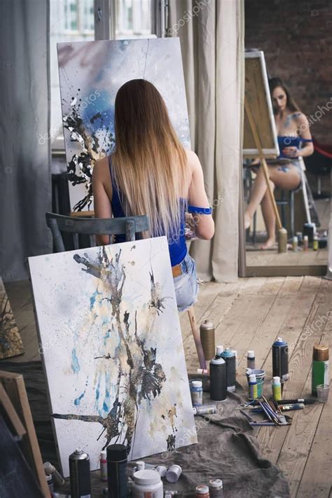 Young Female Artist Painting Abstract Picture In Studio Beautiful Sexy