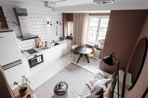 A Tiny Pink Studio Apartment With Loft Bed And Walk In