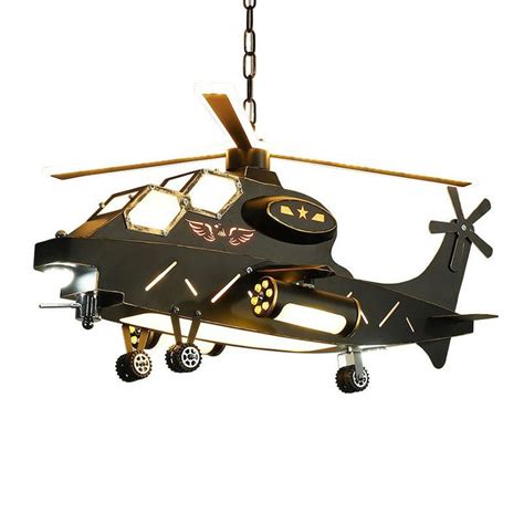 A Helicopter Shaped Chandelier Hanging From A Chain On A White