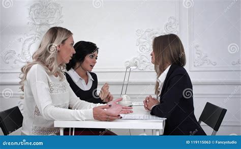 business women working and discussing together at meeting in office stock image image of