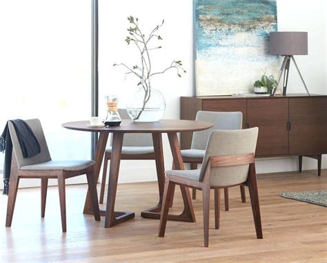 This table, with a waterfall design, was the one. Image result for round dining table chairs fit under ...