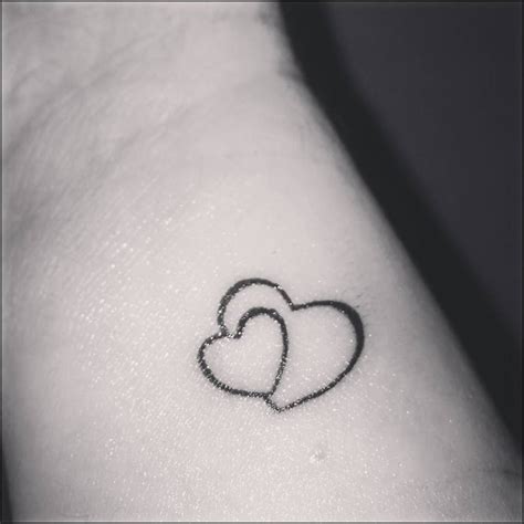 The Meaning Behind The Interlocking Heart Tattoostattoo Themes Idea