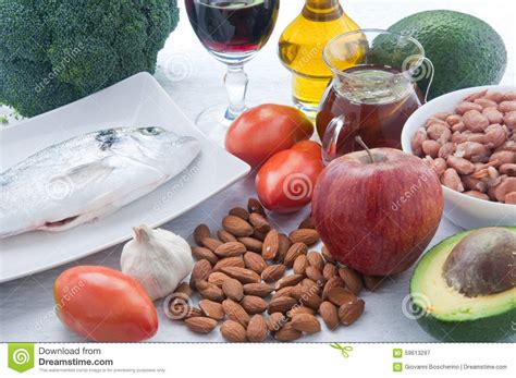 Foods that lower cholesterol include fresh fruits, leafy green vegetables, whole grains, and fish. 10 Foods To Lower Cholesterol Stock Image - Image of fresh ...