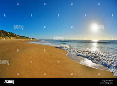 Surf Breaking On The Shoreline Of Ninety Mile Beach At Paradise Beach