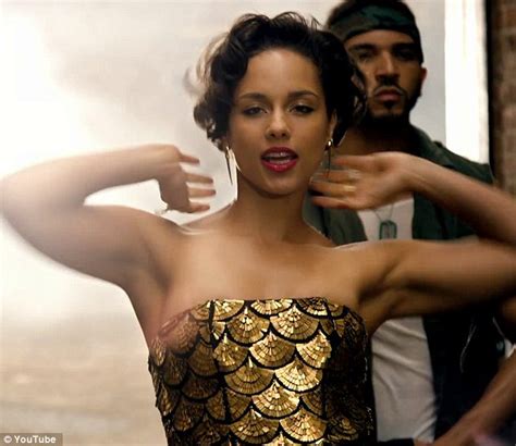 alicia keys shows off her physique in low cut golden bustier in new day video daily mail online