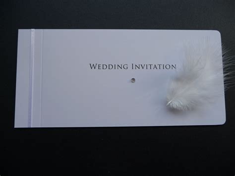 You can also choose to download the most important thing is that you have a wedding invitation you love. White Feather cheque book style wedding invitations | Book style wedding invitations, Wedding ...