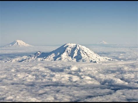 Aerial Shot Of Mt Rainier Mt Adams Mt Hood And Mt St Helens In The