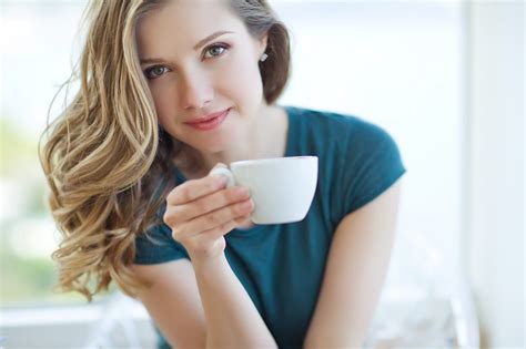 Beautiful Woman Drinking Coffee Hydrosoft® Wellness
