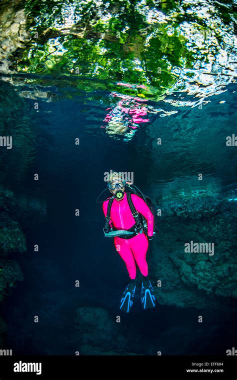 Female Scuba Diver Exploring Underwater Caves Stock Photo Alamy