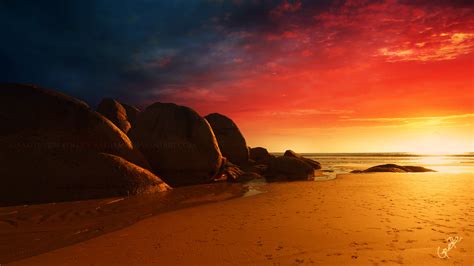 Brown Rock Formation Near Ocean Water During Orange Sunset Beach Sand Sunset Sky Hd