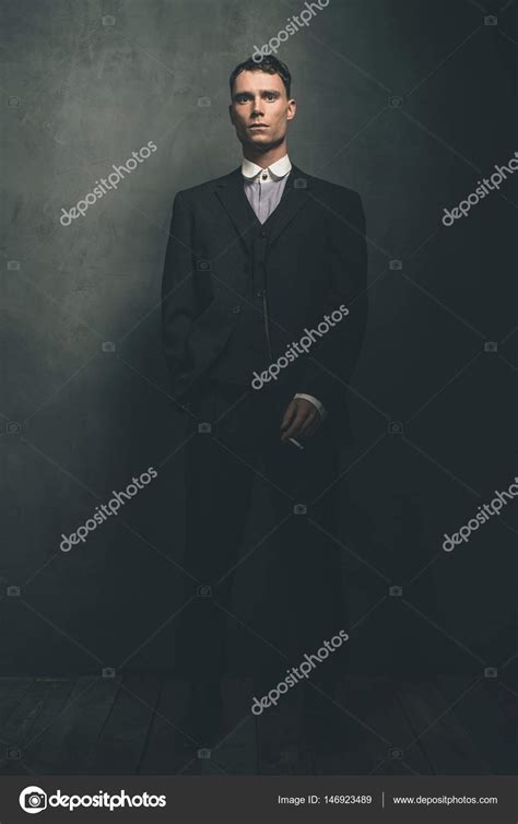 Gangster Standing With Cigarette Stock Photo By ©ysbrand 146923489