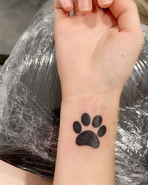 101 Amazing Dog Paw Tattoo Designs You Need To See Dog Paw Tattoo