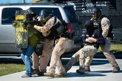 Homeland Security Investigations Special Agents During A Demonstration