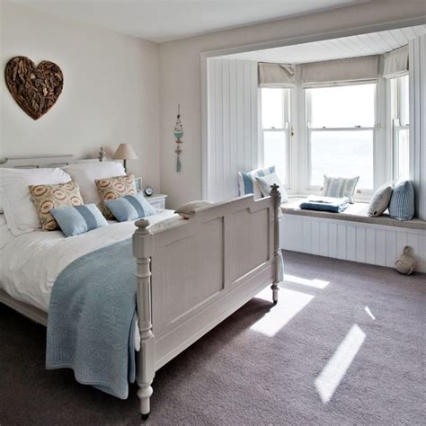 To have the beach feel, get furniture that is white in color next, use some accessories that are completely connected with the beach. Beach themed bedrooms | Ideal Home