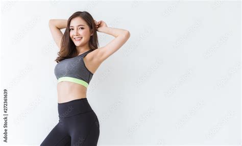 portrait of beautiful cute healthy asian woman body curve with sport wear copy space on white