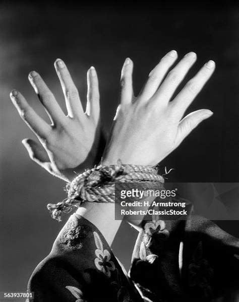Hands Tied Together Photos And Premium High Res Pictures Getty Images