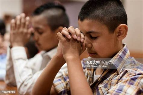 Children Praying Photos And Premium High Res Pictures Getty Images