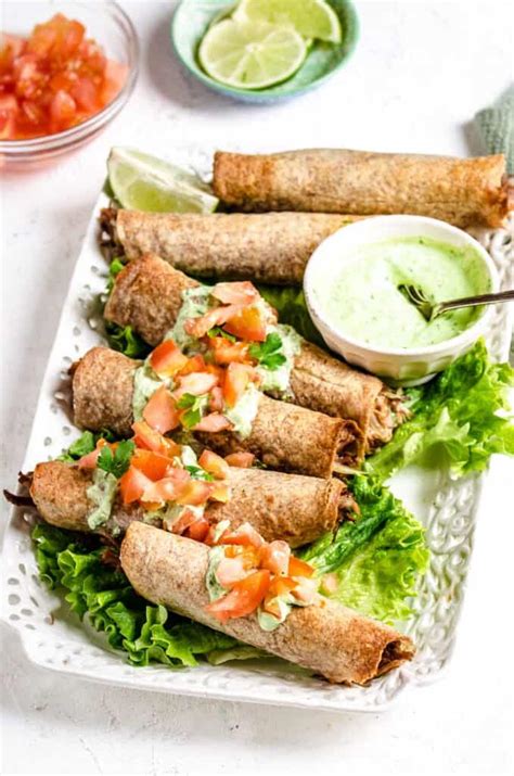 Oven Baked Pulled Pork Flautas With Avocado Crema Diethood