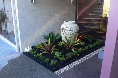 A Small Garden At A Front Entrance Designed And Implemented By Fusion