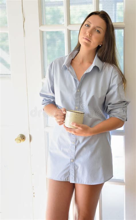 Beautiful Young Woman In Men S Shirt With Coffee Cup Stock Image