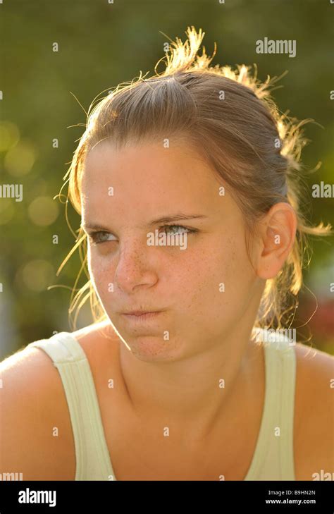 Girl With Grim Expression Stock Photo Alamy