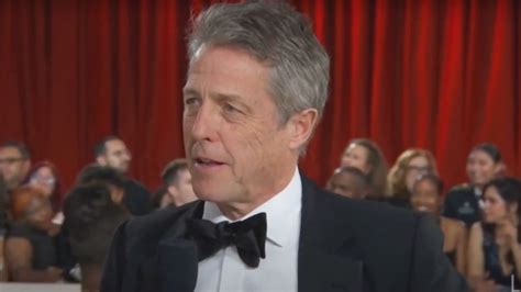 Actor Hugh Grants Red Carpet Interview With Ashley Graham Is Most Awkward Oscars Moment