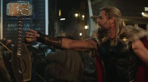 Chris Hemsworth Walks With Mjolnir On The Set Of Thor Love And Thunder
