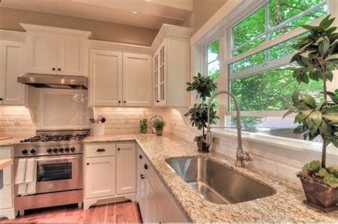 Maybe you would like to learn more about one of these? White kitchen with Giallo Ornamental (also known as ...