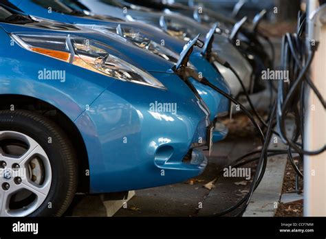 All Electric Nissan Leaf Cars Charging Stock Photo Alamy