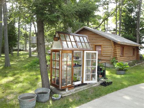 Greenhouse Made From Old Cabin Windows Greenhousediy Old Window