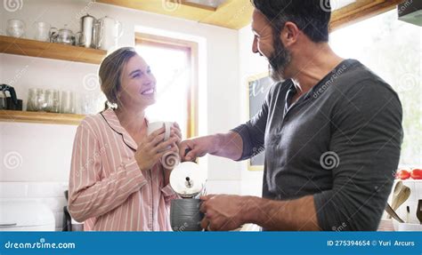 Im Happier With A Sip Of Coffee A Middle Aged Couple Having Coffee In