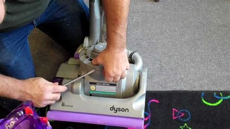 A clogged vacuum hose can be cleaned easily with a bent wire, or a broom. how to check belt repair unclog clean filters dyson animal ...