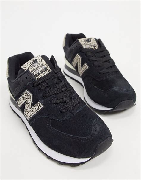 New balance 574 trainers are given a smart feel with suede detailing, so you can team them with your occasion wear or workwear. New Balance Rubber 574 Animal Print Trainers in Black - Lyst
