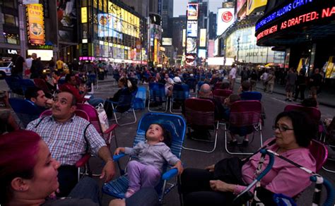 Right in the middle of times square is one times square building is the outer wall fitted with billboards and large screen television. Times Square's New Scene-Stealer: 376 Rubber Lawn Chairs ...