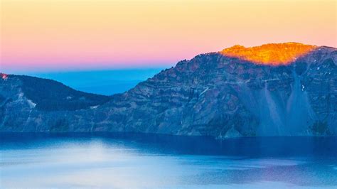 Download Wallpaper 1366x768 Mountains Lake Sunset Horizon Crater