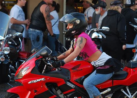 Tattooed Motorcycle Girl Riding A Red Honda Cbr She Wears Pink Top