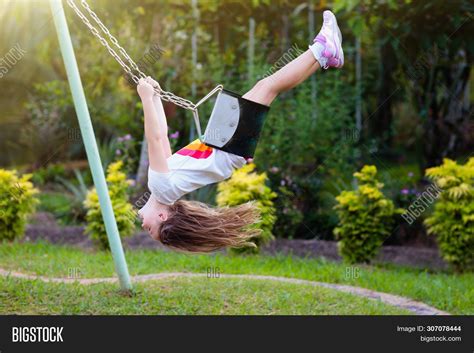 Child Swinging On Image And Photo Free Trial Bigstock