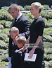 Lachlan Murdoch and Sarah Murdoch walk with their children Kalan and ...