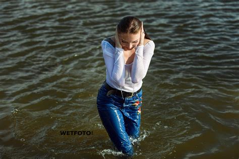 Wetlook By Gorgeous Girl In Wet Tight Jeans Blouse And Jacket On The