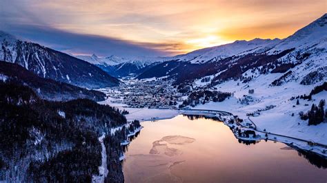 Body Of Water Near Mountains Covered By Snow During Sunset Hd Beautiful