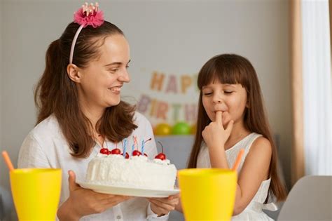 Premium Photo Beautiful Young Adult Woman Holding Holiday Dessert For