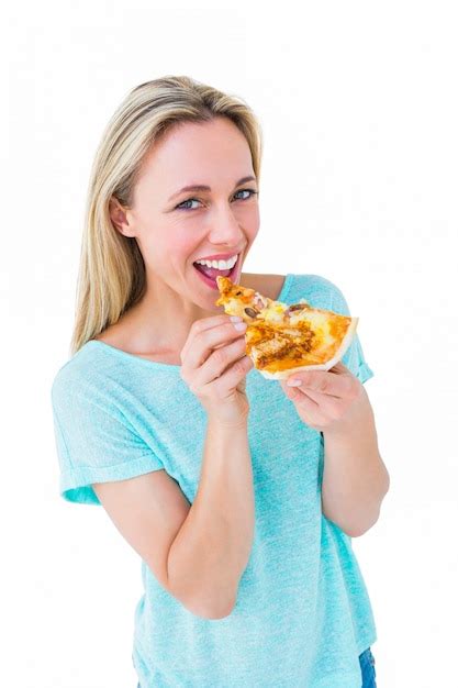 Premium Photo Cheerful Blonde Eating Slice Of Pizza