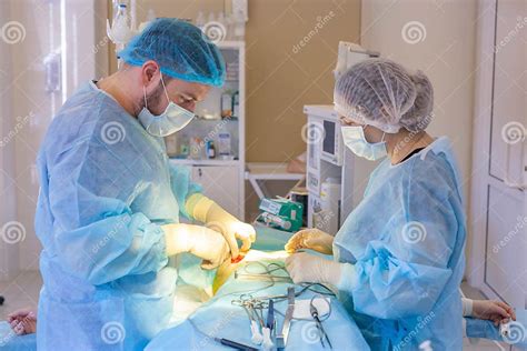 Hospital Surgeon Operates In The Operating Room Surgeon Starts The